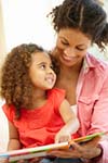 Mother reading with child